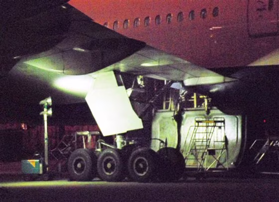 In this photo taken Feb. 7, a landing gear of a Delta Airlines plane is seen at the Narita international airport in Narita, east of Tokyo, Japan.